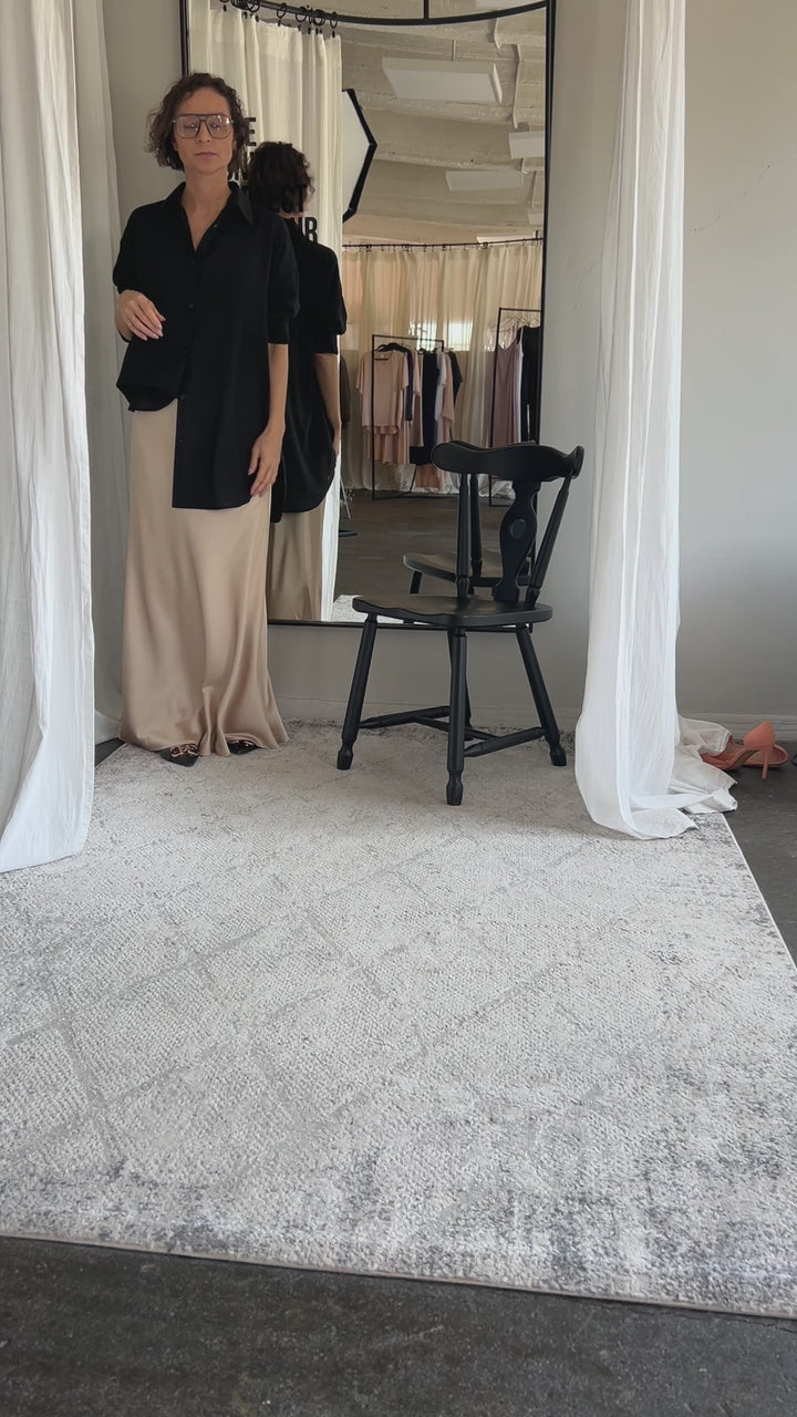 Zīda satīna svārki krēma krāsā